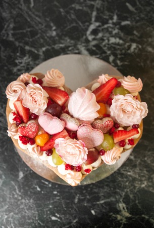 Heart shaped cake for Valentine's Day or mother's day on background