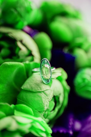 Flower peony roses painted in neon light. Abstract background with flowersの写真素材