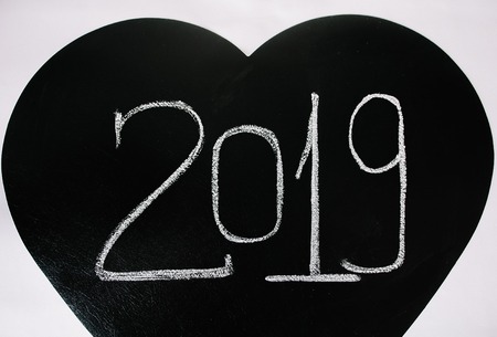 Year 2019 chalked text on a chalkboard.の写真素材