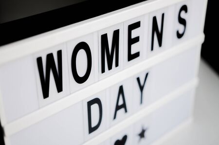 The inscription in dark letters on a white background Women's Day March 8の写真素材