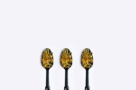 Fish oil, omega 3 capsules on a light background. Healthの写真素材