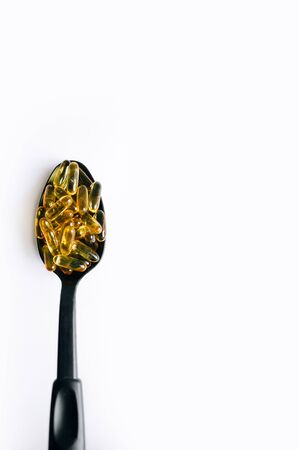Fish oil, omega 3 capsules on a light background. Healthの写真素材