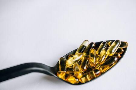 Fish oil, omega 3 capsules on a light background. Healthの写真素材