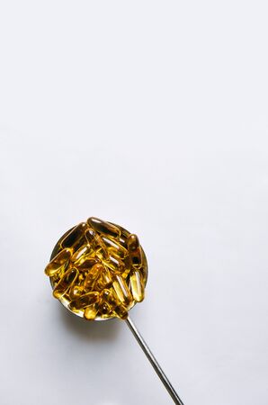 Fish oil, omega 3 capsules on a light background. Healthの写真素材