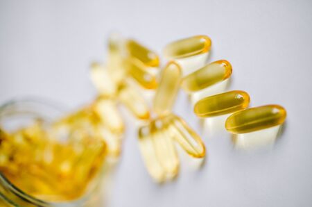 Fish oil, omega 3 capsules on a light background. Healthの写真素材