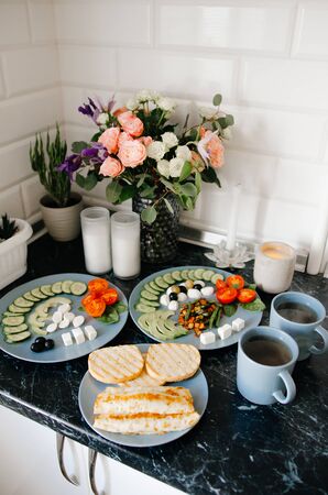 Beautiful breakfast for two at home. Home comfort and proper healthy food.の写真素材