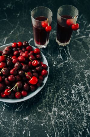 Healthy desserts. Tasty cherry jelly on a dark background.の写真素材