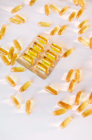 Omega 3 Fish Oil Supplement Capsules Isolated on a White Background macro.