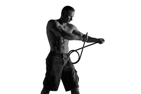 Adult male fighter MMA. In a studio.