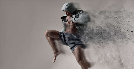 Adult male fighter MMA. In a studio.の写真素材