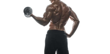 Fitness model Man posing in the studio. White background. Isolated.の写真素材