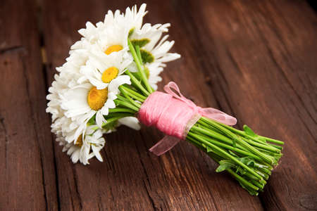 delicate bouquet of white daisiesの写真素材