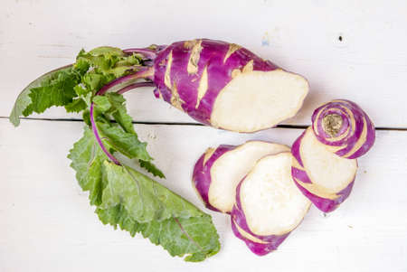 Sliced ??kohlrabi - the original kind of cabbage, long form, lilac shades, top view