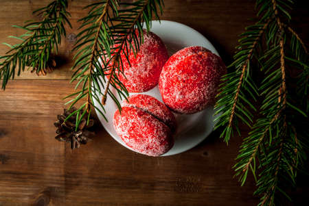 Traditional Russian and Ukrainian Christmas sweet pastries called "peaches" that looks like Christmas tree ballsの写真素材