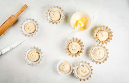 Cooking fashionable baking - scones cruffins (puffmaffin), a mixture of a croissant and a muffin.の写真素材