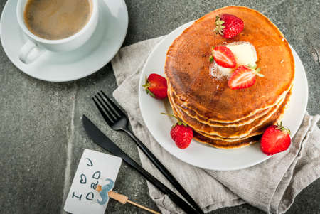 Celebrating Father's Day. Breakfast. The idea for hearty and delicious holiday breakfast: pancakes...
