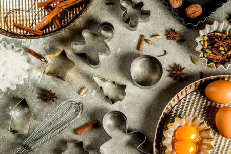 Baking equipment and ingredients, cooking christmas pastries and cookies background, vintage, top view, gray stone table, copy spaceの写真素材