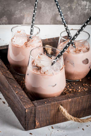 Summer refreshment drinks. Chilled iced chocolate cocoa. With scoop of chocolate ice cream,...