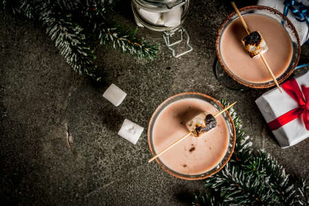 New Year and Christmas drinks idea, Toasted smores martini, dark background, copy space top viewの写真素材