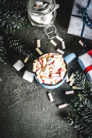 New Year and Christmas drinks idea, hot chocolate mug with marshmallow, dark background, copy spaceの写真素材