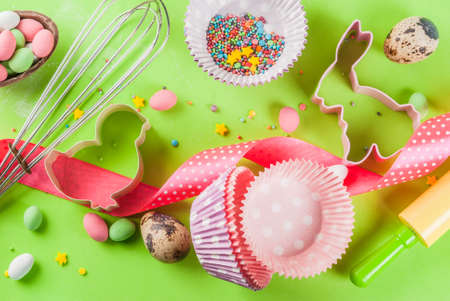 Sweet baking concept for Easter, cooking background with baking - with a rolling pin, whisk for...
