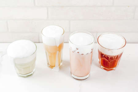 Trendy food and drinks, assortment 4 kinds of Cheese Tea with whipped cream cheese, on white backgroundの写真素材