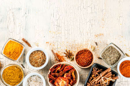 Set of various spices on light concrete background. Copy space.の写真素材