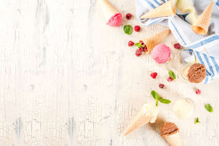 Summer sweet berries and desserts, various of ice cream flavor in cones pink (raspberry), vanilla...