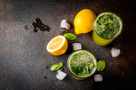 Indian traditional drink, Mint Masala Soda cocktail with lemon, mint and spices, dark background, copy space top viewの写真素材