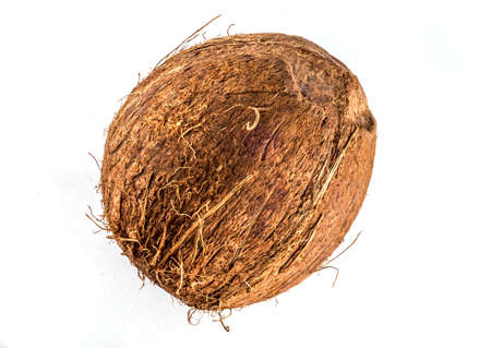Coconut, whole nut, isolate on white backgroundの写真素材