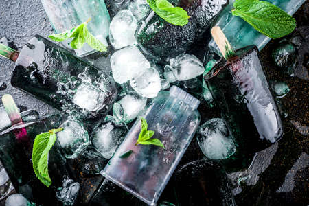 Trendy food, Asian vegan desserts, homemade ice cream popsicles with algae spirulina, served with...