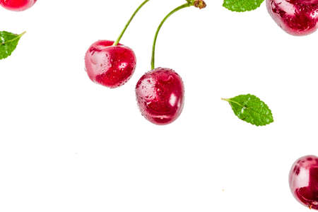 Raw fresh cherry with water drops, simple pattern isolated on white backgroundの写真素材