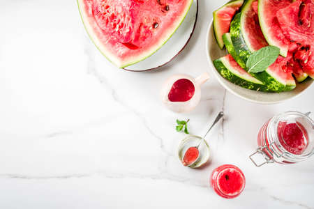 Homemade sweet watermelon jam, white marble background copy spaceの写真素材