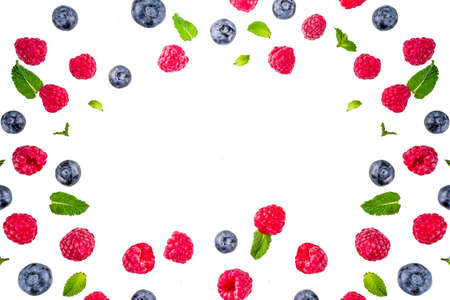 Creative layout with raspberry and blueberry with waffle ice cream cones, simple pattern above copy...