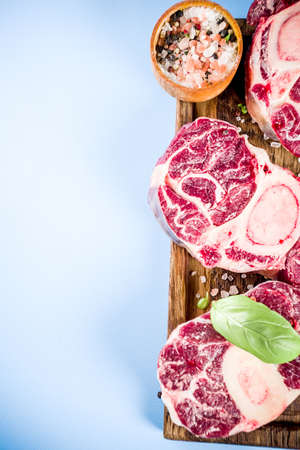 Fresh raw beef meat with spices for cooking, top view copy spaceの写真素材