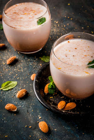 Traditional Indian beverage, Holi festival food, Thandai Sardai milk drink with nuts, spices, mint....