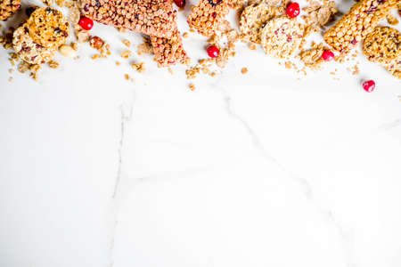 Multi grain granola muesli bar. Healthy sweet food, diet snack, with dried berries, nuts, cereals...