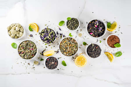 Assortment of various dry tea - classic black and green, flower, fruit, berry and herbal tea blends,...