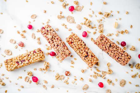 Multi grain granola muesli bar. Healthy sweet food, diet snack, with dried berries, nuts, cereals...