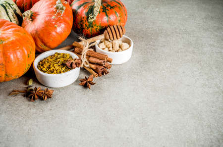 Set of homemade pumpkin spice, various ingredients for pumpkin pie, cookies and coffee latte