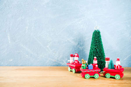 Christmas concept background with artificial xmas tree, new year decorations and gift box, copy spaceの写真素材