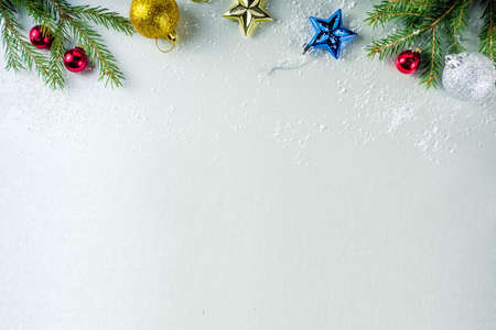 Christmas festive background with xmas tree, decoration on silver background copy space banner...
