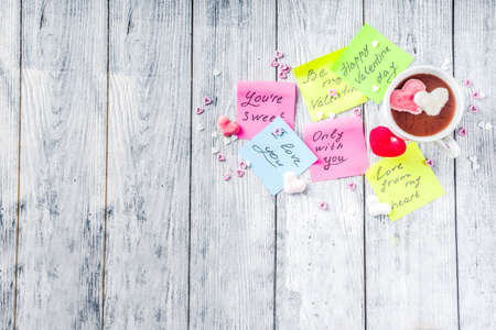 Valentines day concept, stickers with traditional valentine wishes, hot chocolate with marshmallow...