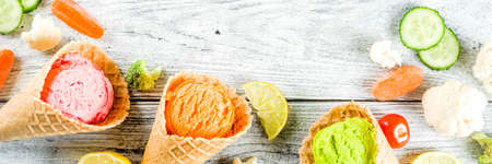 Trendy vegan food, summer healthy dessert concept, colorful diet vegetable ice cream with avocado,...