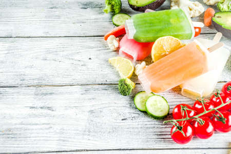 Trendy vegan food, vegetable ice cream , avocado, cucumber, tomato, beet, carrot, broccoli, cauliflower creamy gelato. Dietary healthy lifestyle, summer cold dessert.の写真素材