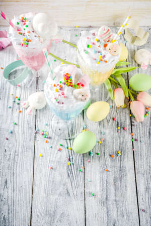 Funny easter food, ideas recipes for children Easter party, colorful blue yellow pink milkshakes...