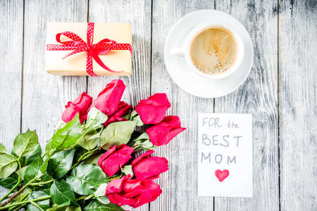 Mother's day greeting background concept, with red rose flowers, greeting card For best Mom wooden...