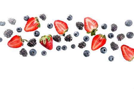 Fresh berries pattern - blueberries, strawberries, blackberries. On white background, top view,...
