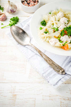 Healthy food, diet lunch. Soup with meatballs, fresh vegetables and greens.の写真素材