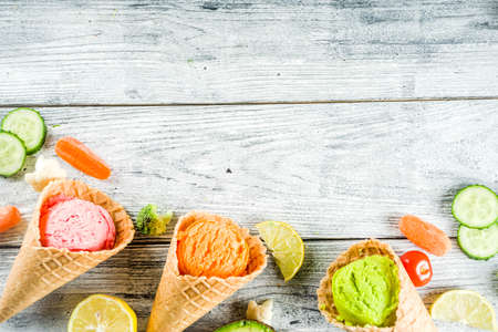 Trendy vegan food, summer healthy dessert concept, colorful diet vegetable ice cream with avocado,...